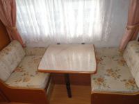 автокемпер tabbert baronessa 650  стол и кресло-кровати